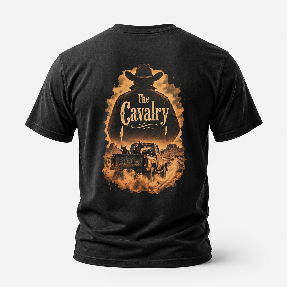Black The Cavalry Vintage Ranch Truck T-shirt, back view featuring an old ranch truck racing down a dirt road with dogs in th
