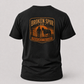 Black Finish What You Start Work Ethic T-shirt, back view featuring a ranch hand closing the last gate at dusk