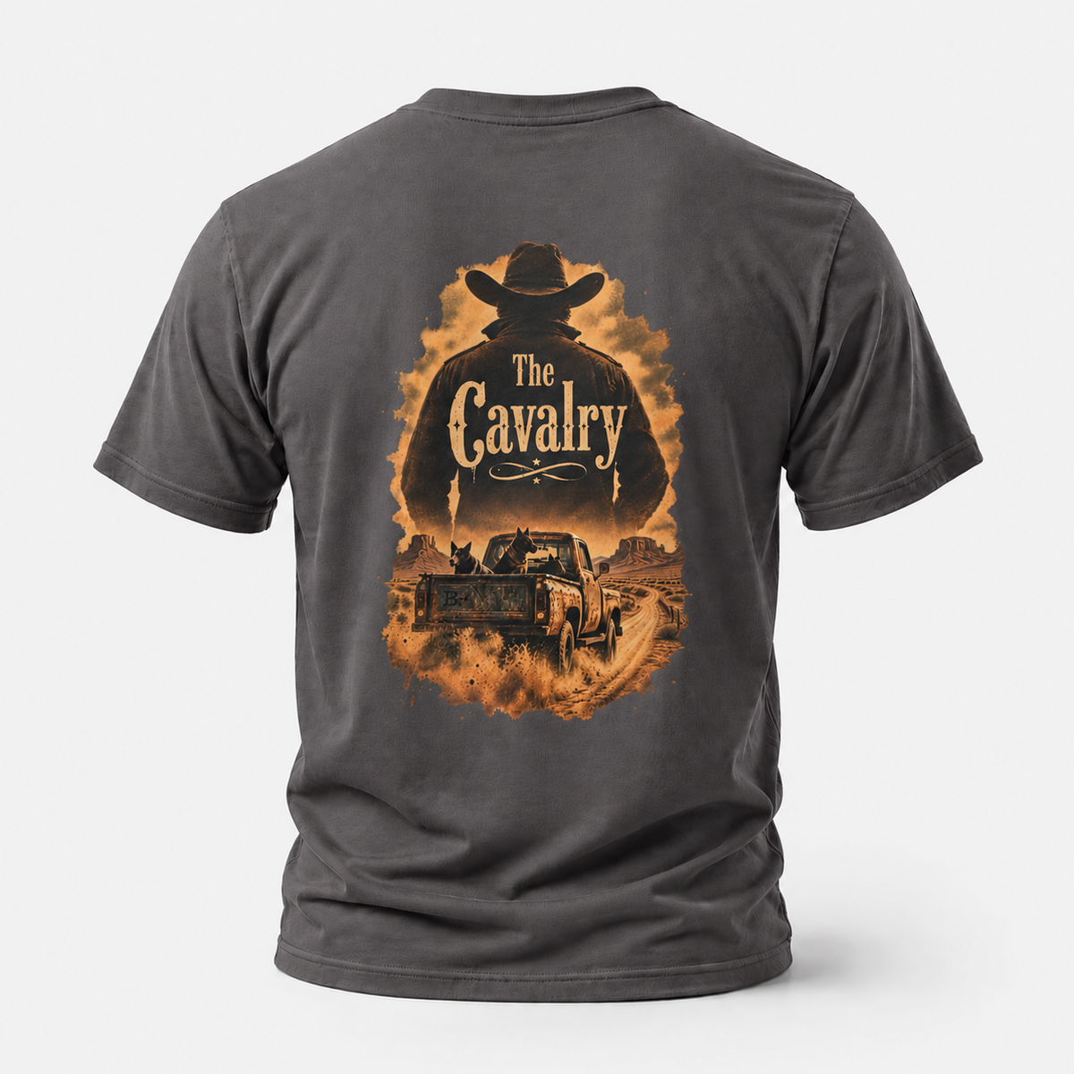 Charcoal The Cavalry Vintage Ranch Truck T-shirt, back view featuring an old ranch truck racing down a dirt road with dogs in