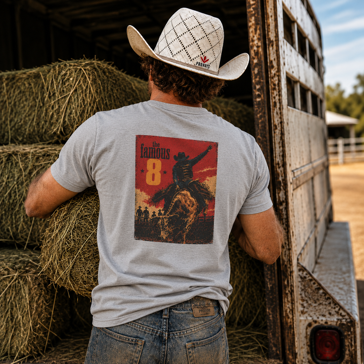 Lifestyle view of The Famous 8 Bull Riding T-shirt featuring a bull rider chasing rodeo's famous eight seconds
