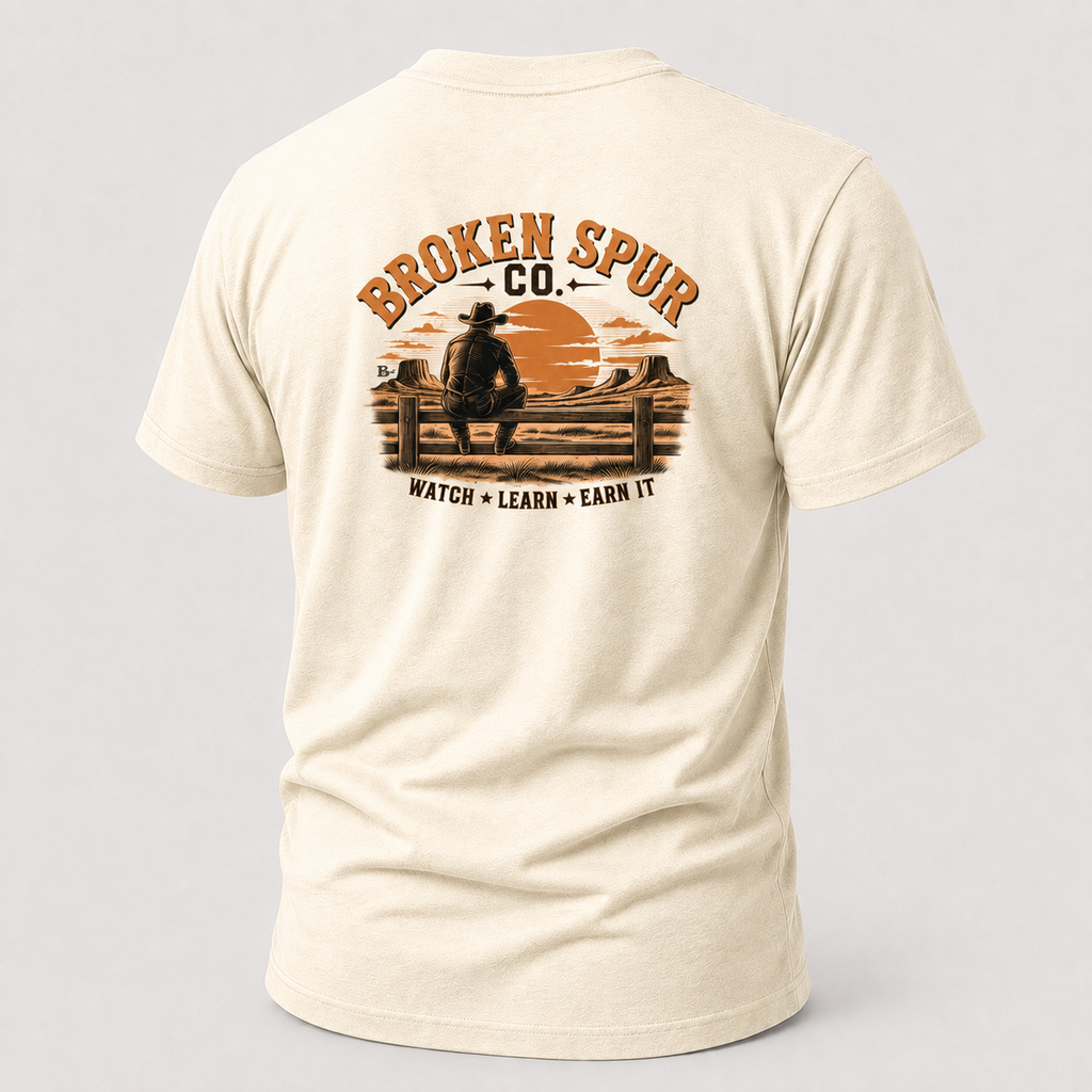 Natural The Fence Ranch Hand T-shirt, back view featuring ranch hands learning the work along a fence line