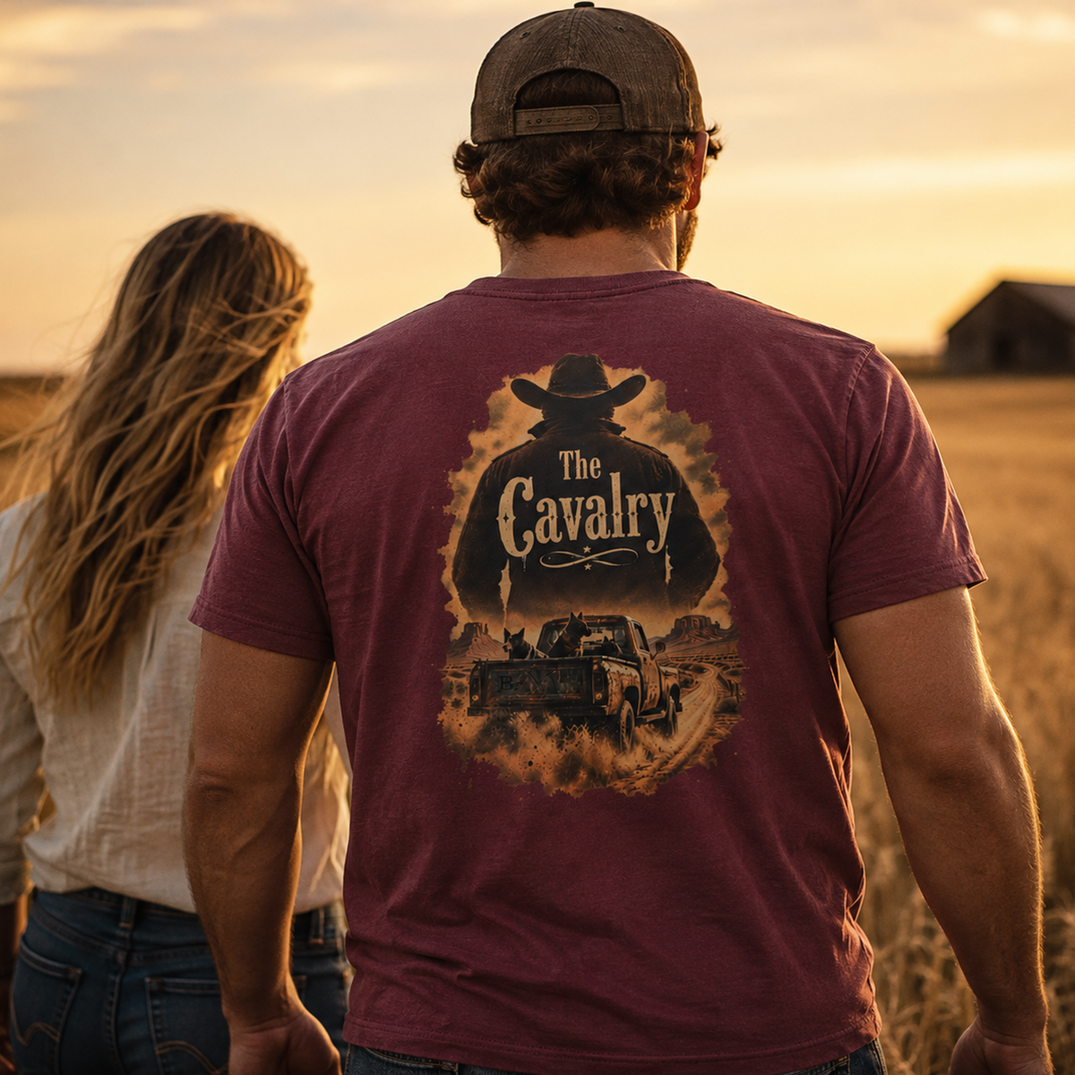 Lifestyle view of The Cavalry Vintage Ranch Truck T-shirt featuring an old ranch truck racing down a dirt road with dogs in t